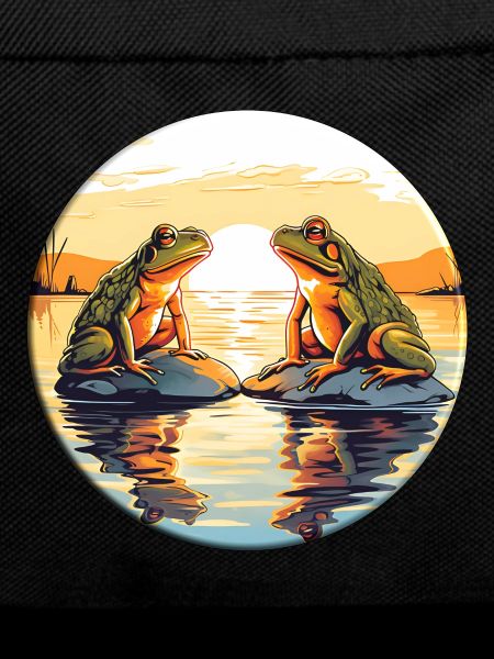 Two frogs enjoying the sunset