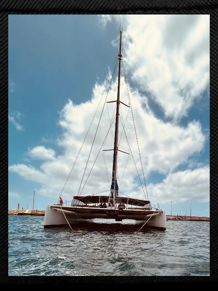 Sailing catamaran over the water