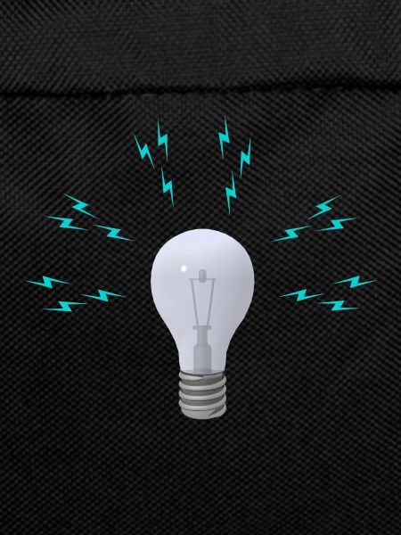 Lightbulb with lightning symbols