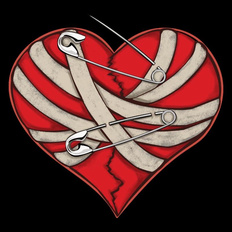 Bandage cardiaque cassé et épingles de sûreté