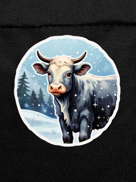 Rind auf winterlicher Alm
