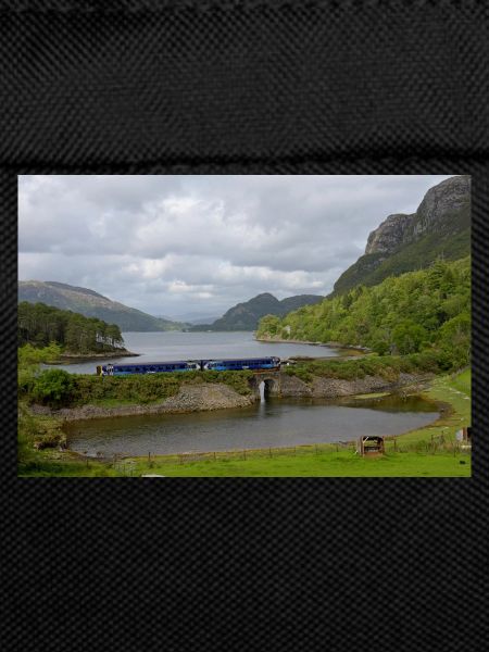 ScotRail train passing Scottish Loch
