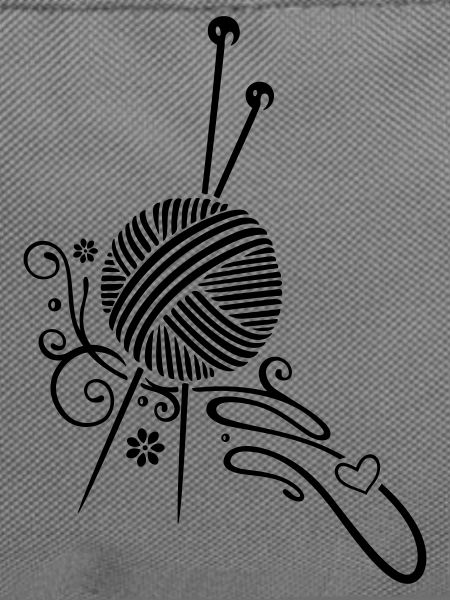 Knitting needles with wool and flowers.