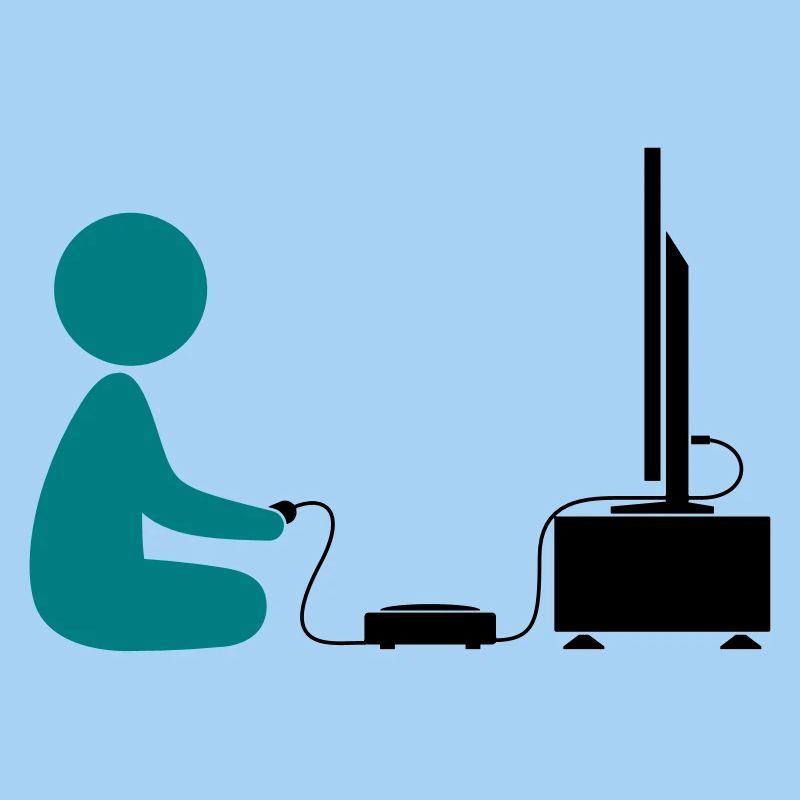 Un garçon joue avec sa console de jeux