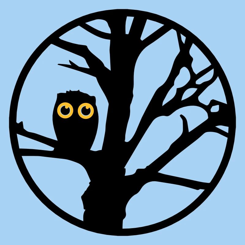 An owl sitting on a tree
