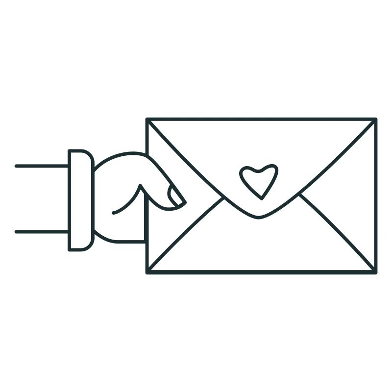 hand holding and envelope with a love heart