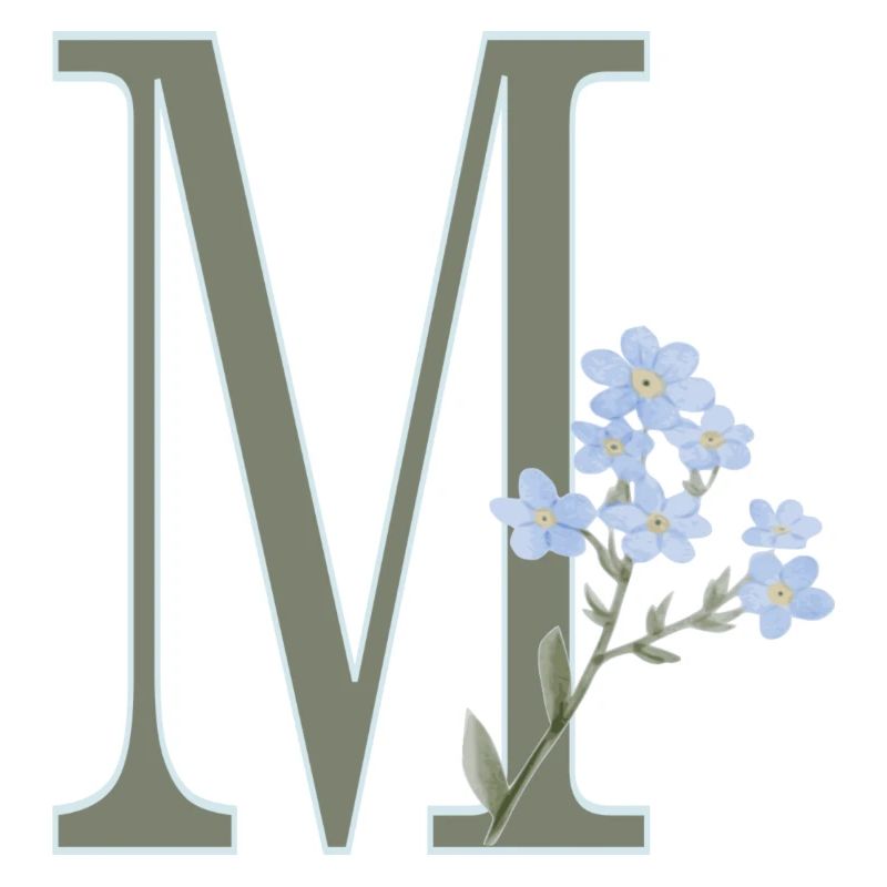 M à fleurs bleues