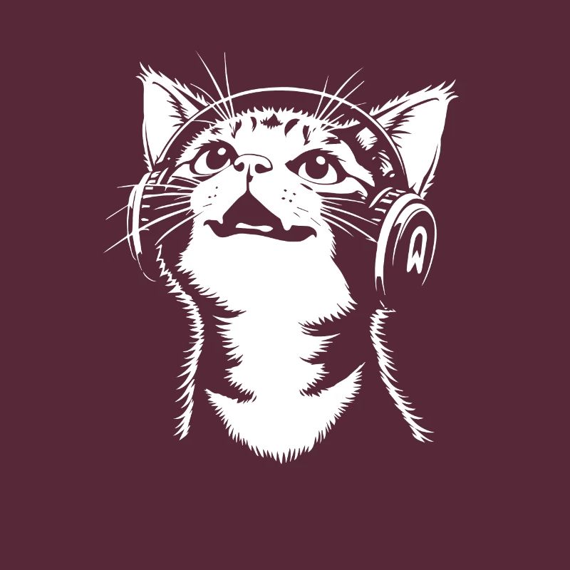 Chat mignon avec des écouteurs - écouter de la musique
