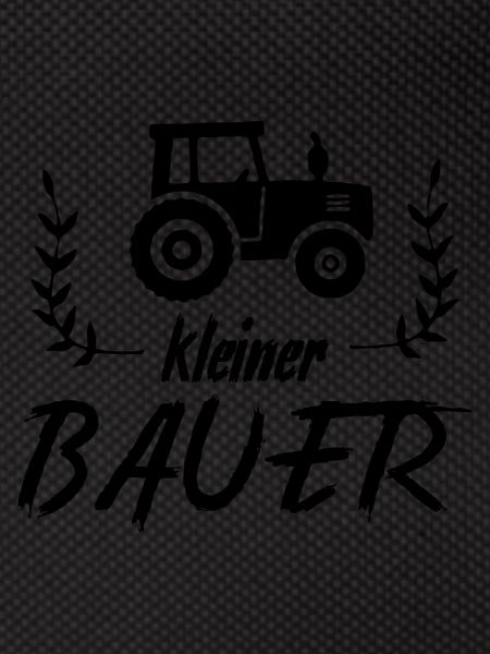 Kleiner Bauer mit Traktor