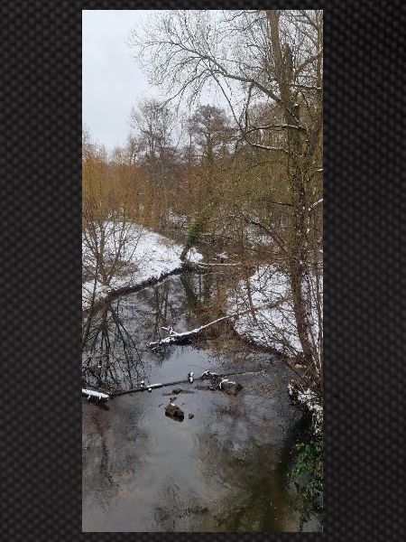 Winter river in the fog