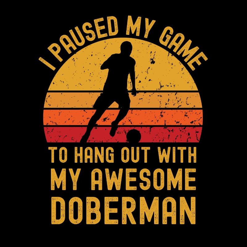 Fußball und Dobermann
