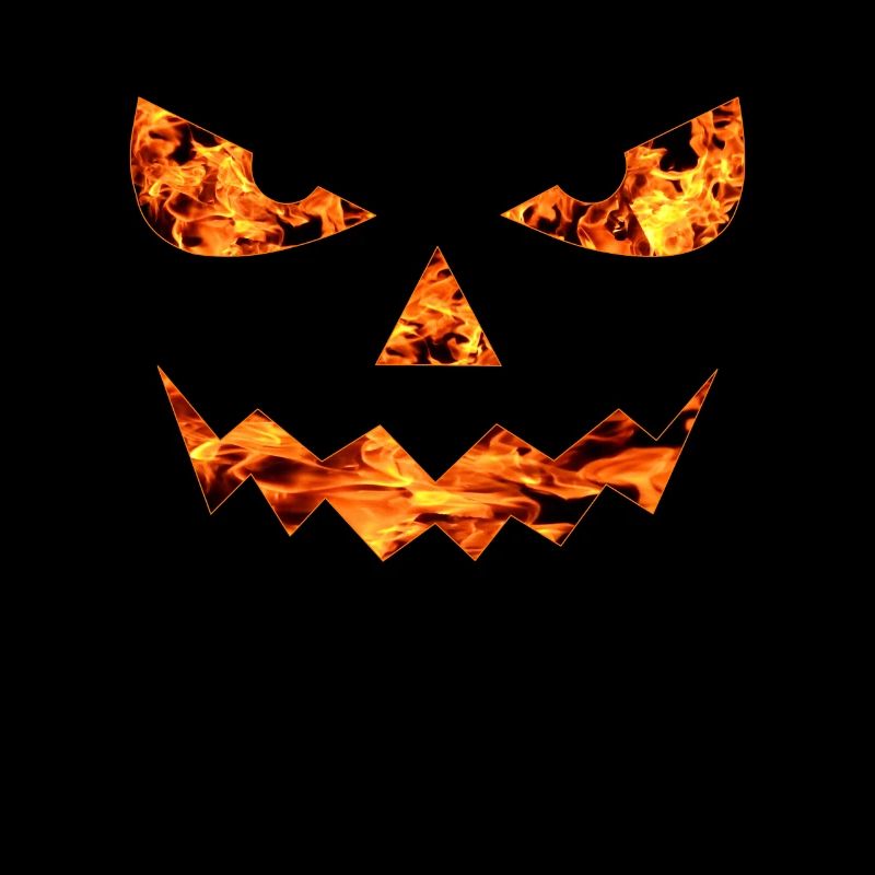 GRIMACE DE VISAGE DE FEU D’HALLOWEEN DE CITROUILLE