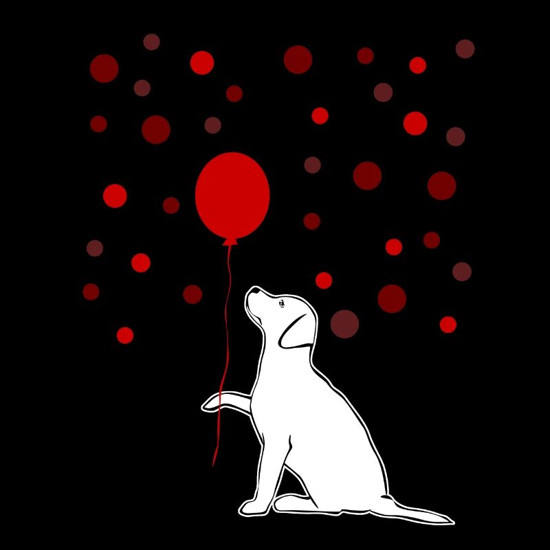 Labrador Retriever avec ballon rouge