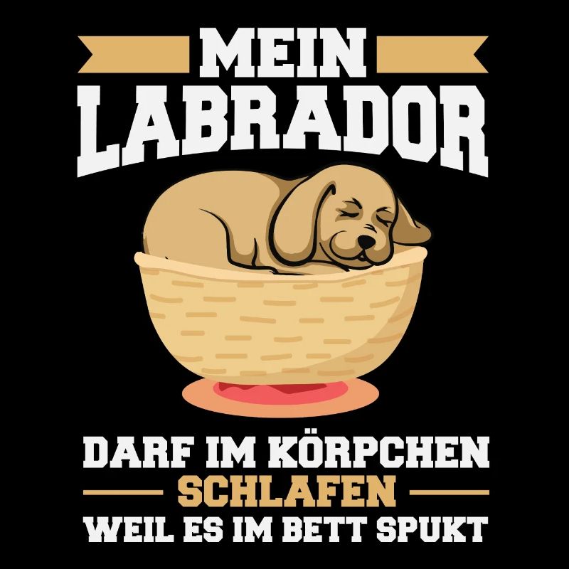 Labrador darf im Körbchen schlafen
