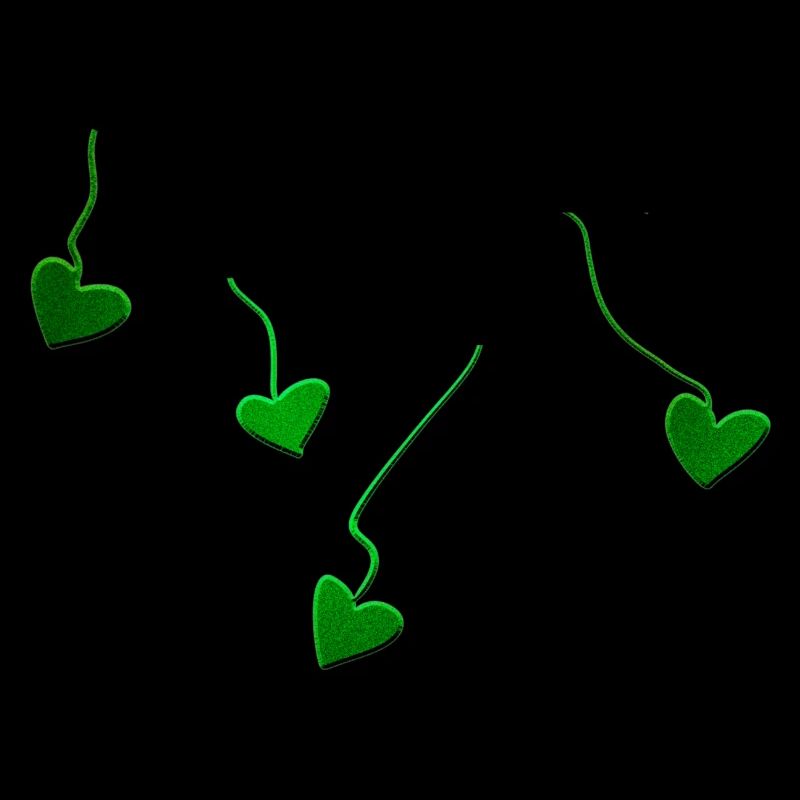 lignes scintillantes de cœurs verts