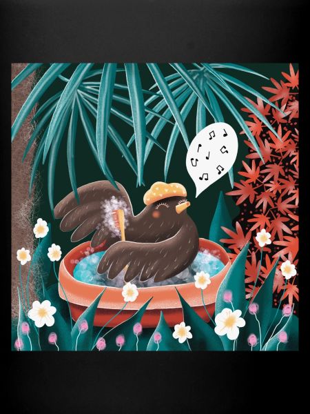 Singing blackbird bathing