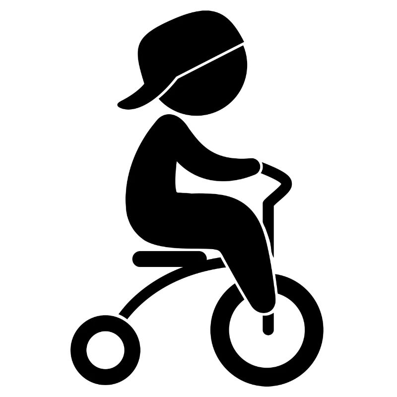 Boy Riding His Tricycle