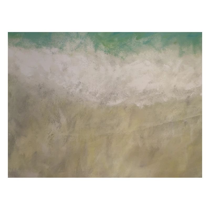 Welle trifft Strand