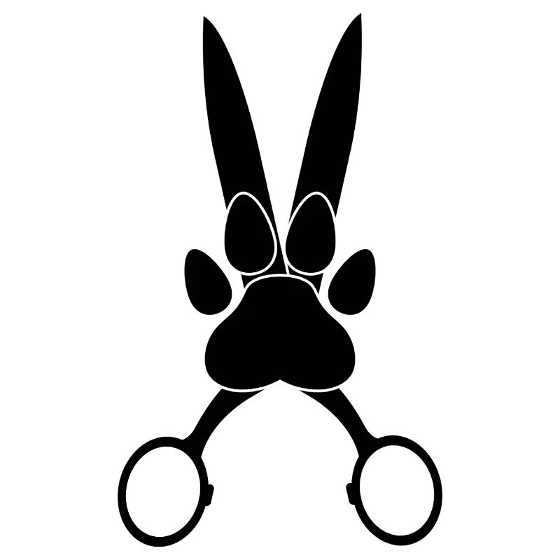 Patte de chien sur ciseaux