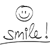 Handwriting "SMILE!" with a laughing face