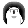Bär mit Sonnenbrille in Höhle