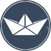 Paper boat on blue circle