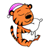 Tiger with pillow and sleeping cap