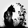 Silhouette Katze im Gras