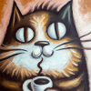 Cat enjoys coffee