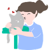 Woman kissing her cute cat