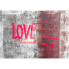 LOVE painted on rusty panel