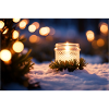 Glass candle in the snow