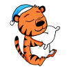 Tiger with pillow and nightcap