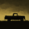 Silhouette di camioncino all'orizzonte