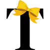 Letter t yellow bow