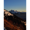 Sunset over snow-capped peaks