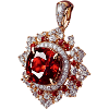Red gemstone set in silver pendant