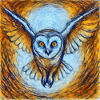Glowing owl in flight