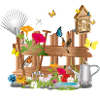 liebevoll gestalteter bunter Gartenzaun mit Blumen