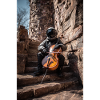 Astronaut Playing Cello on Stone Steps