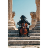 Cosmic Astronaut Playing Cello Amid Ruins