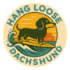 Surfer dachshund in sunset