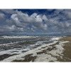 Coastal Magic: Waves and Clouds Holland