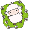 Happy sheep on flowering grass