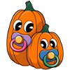 Pumpkin couple with pacifier