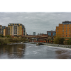 Urban River Scene with Bridge