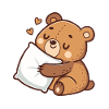 Soft cuddly bear on pillow