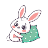 Cuddly bunny and green cushion