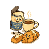 Kondensmilch und Croissant Kaffee