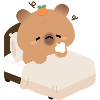 Sleepy Capybara in Cozy Bed